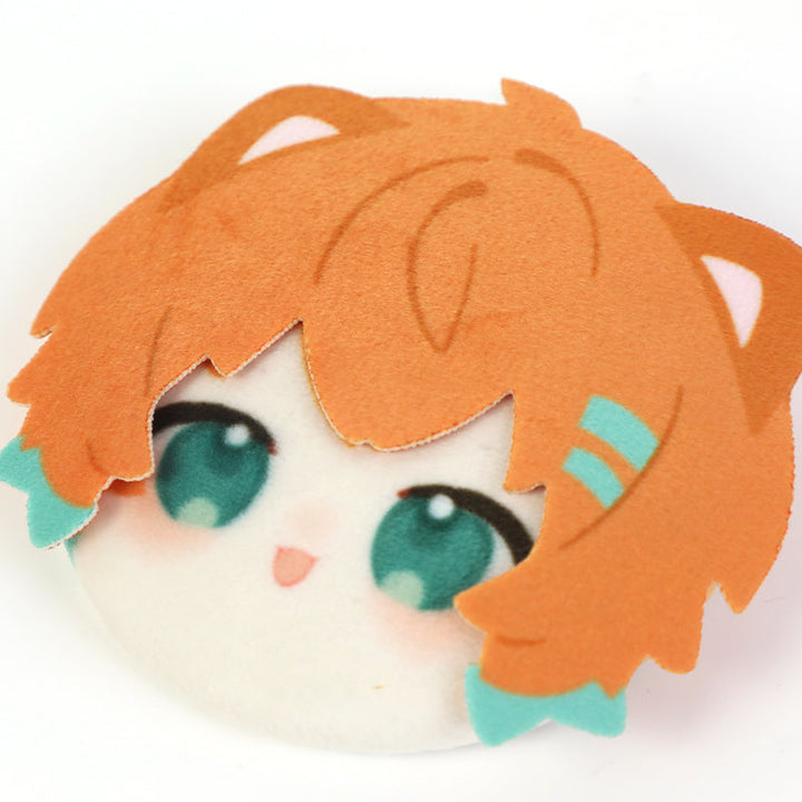 Custom 3D plush button pin featuring a cute anime face with orange hair and teal eyes